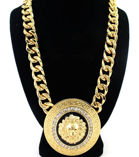 authentic versace lion necklace.